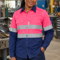 African woman wearing the pink-and-navy work shirt