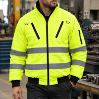 Worker wearing the lime jacket in a workshop